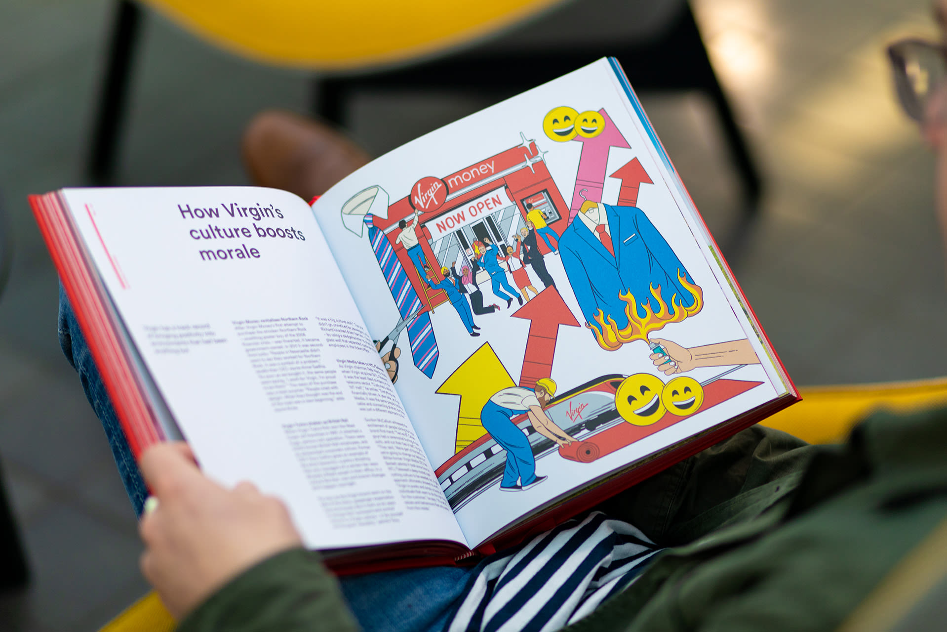 Double spread of  Virgin By Design being held by a man reading it