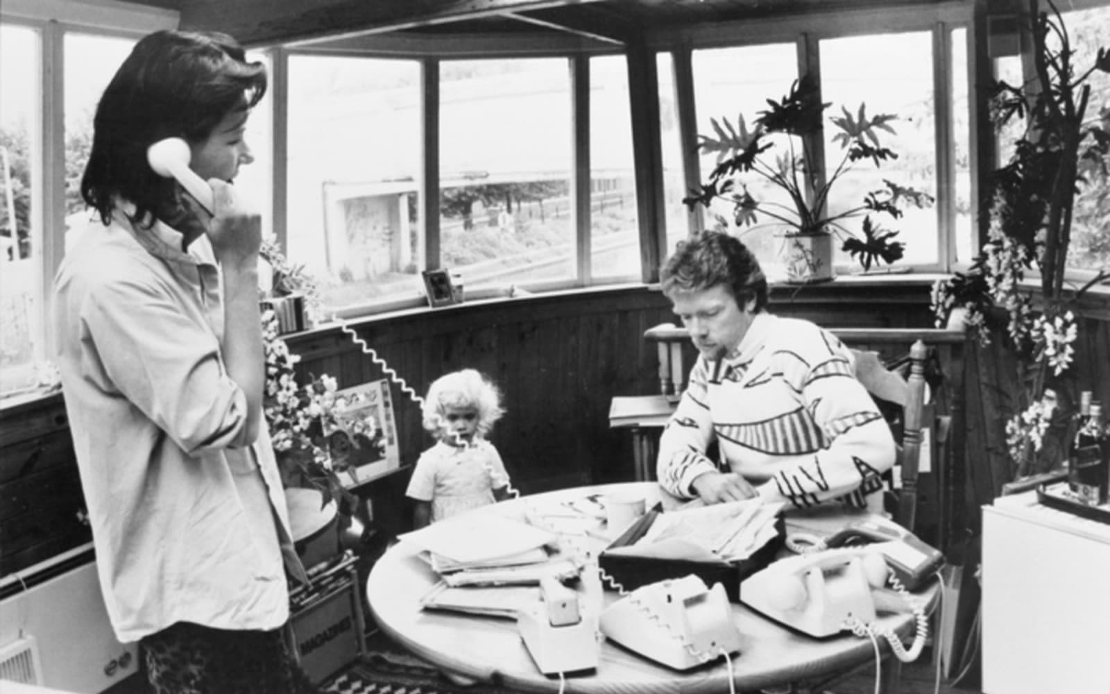 Richard and Holly Branson as a child at a desk on a houseboat