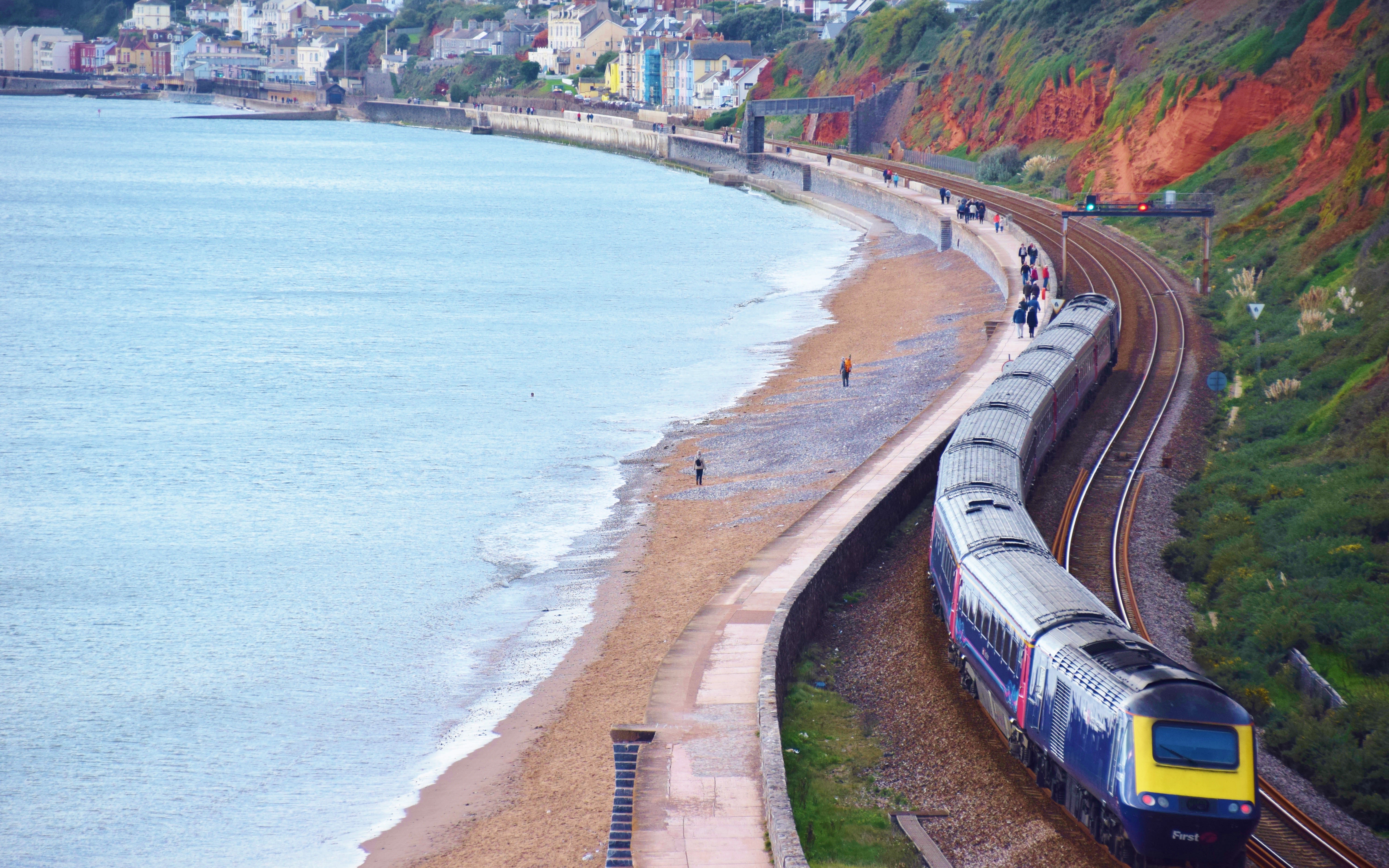 An image of a train passing through Dawlish in Devon.