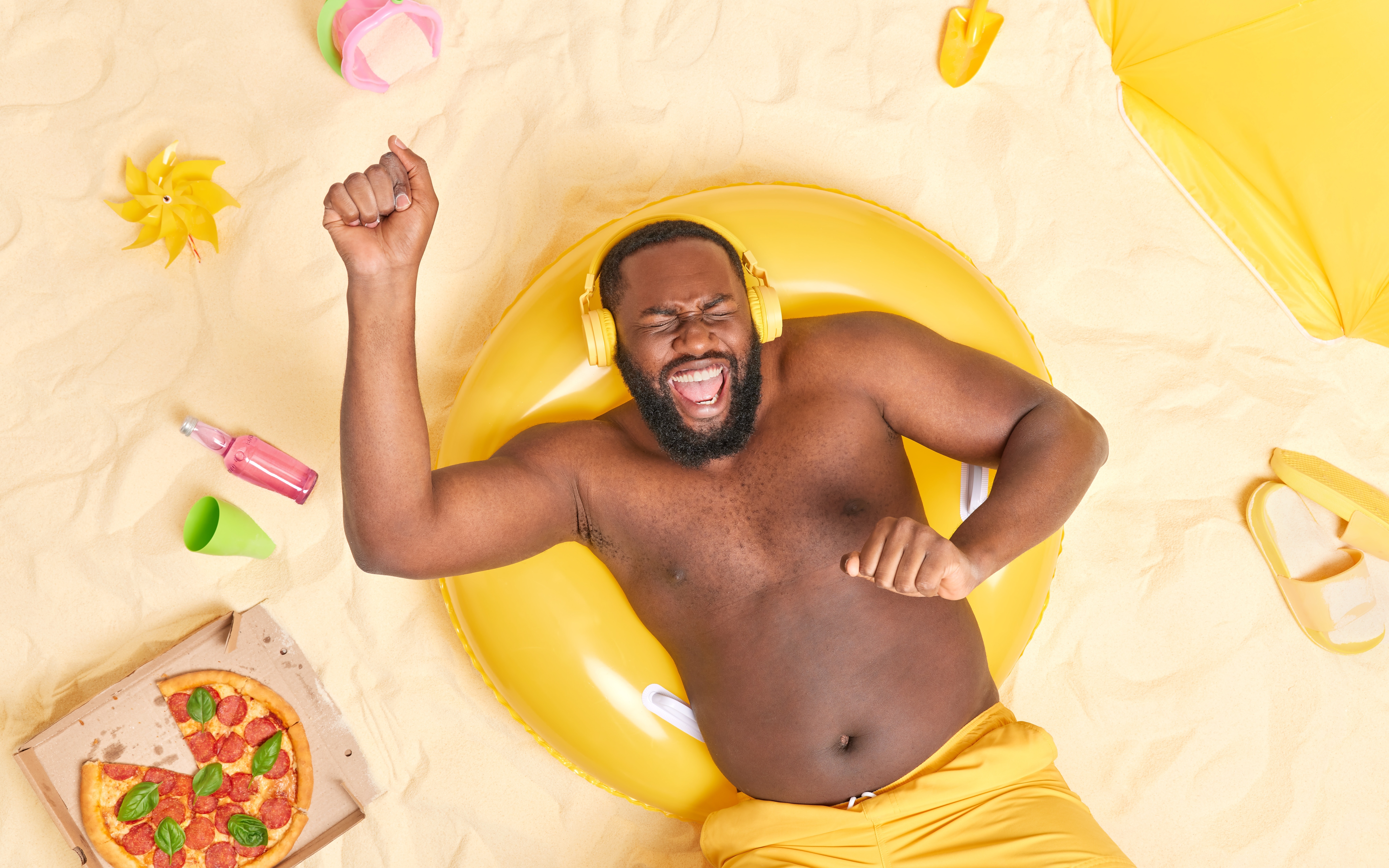 An image of a happy young man enjoying summer. 