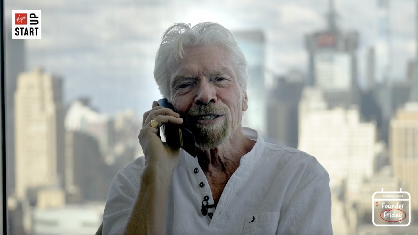 Richard Branson talking on the phone
