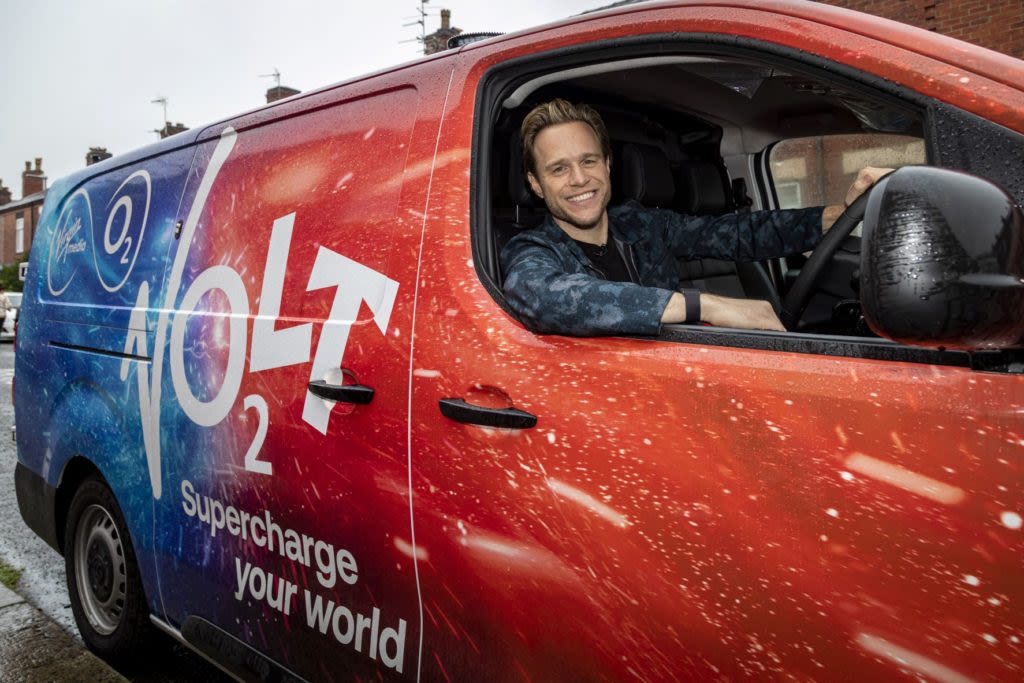 Olly Murs driving a Virgin Media O2 van with Volt written on the side