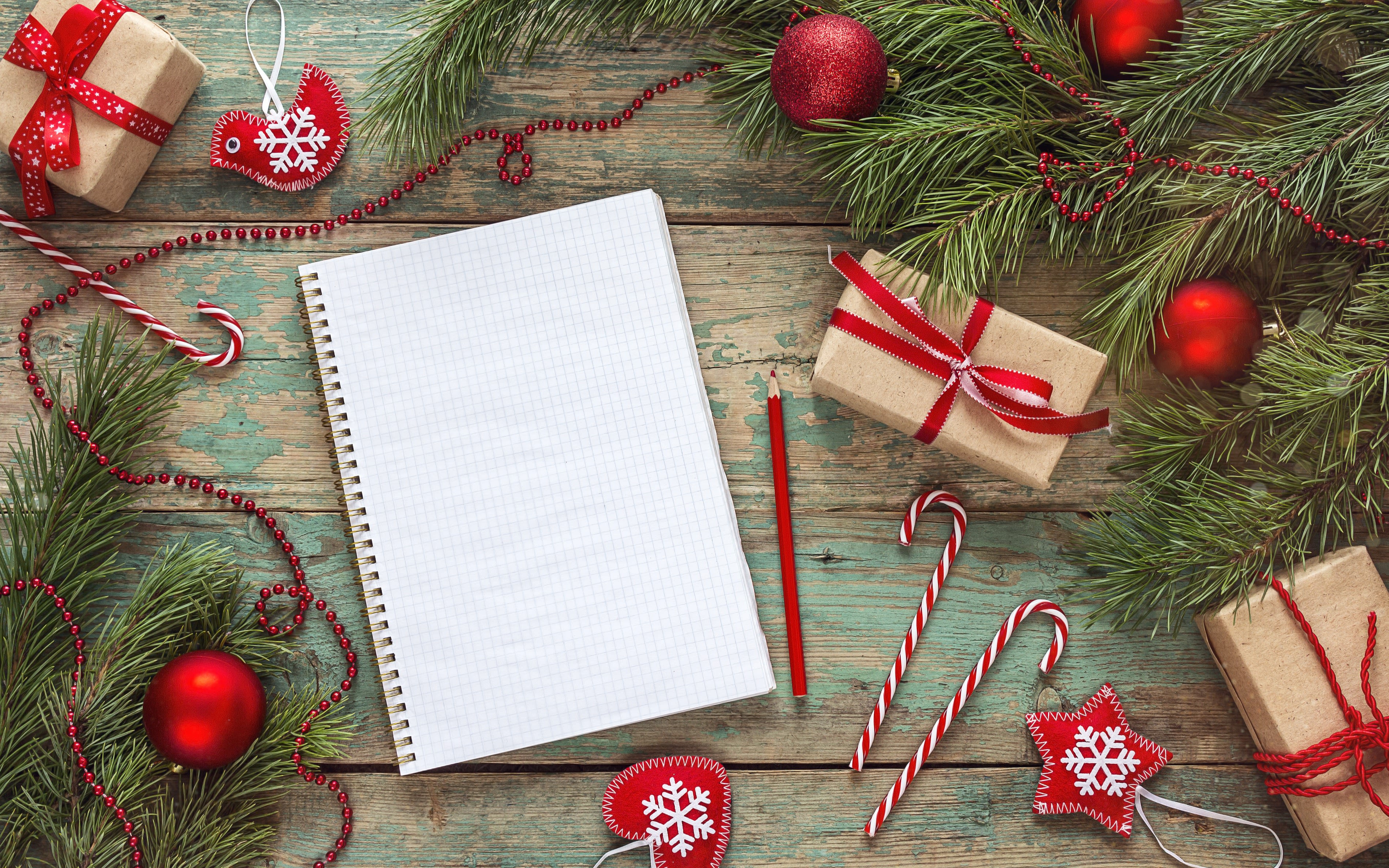 A notepad with Christmas background