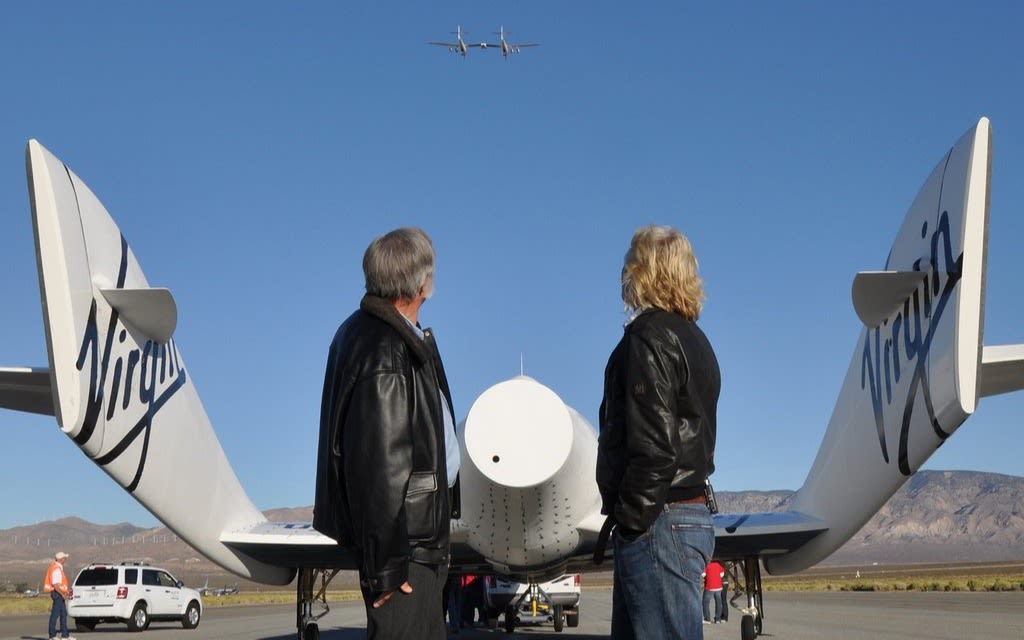 Richard Branson looks at VMS Eve in the sky