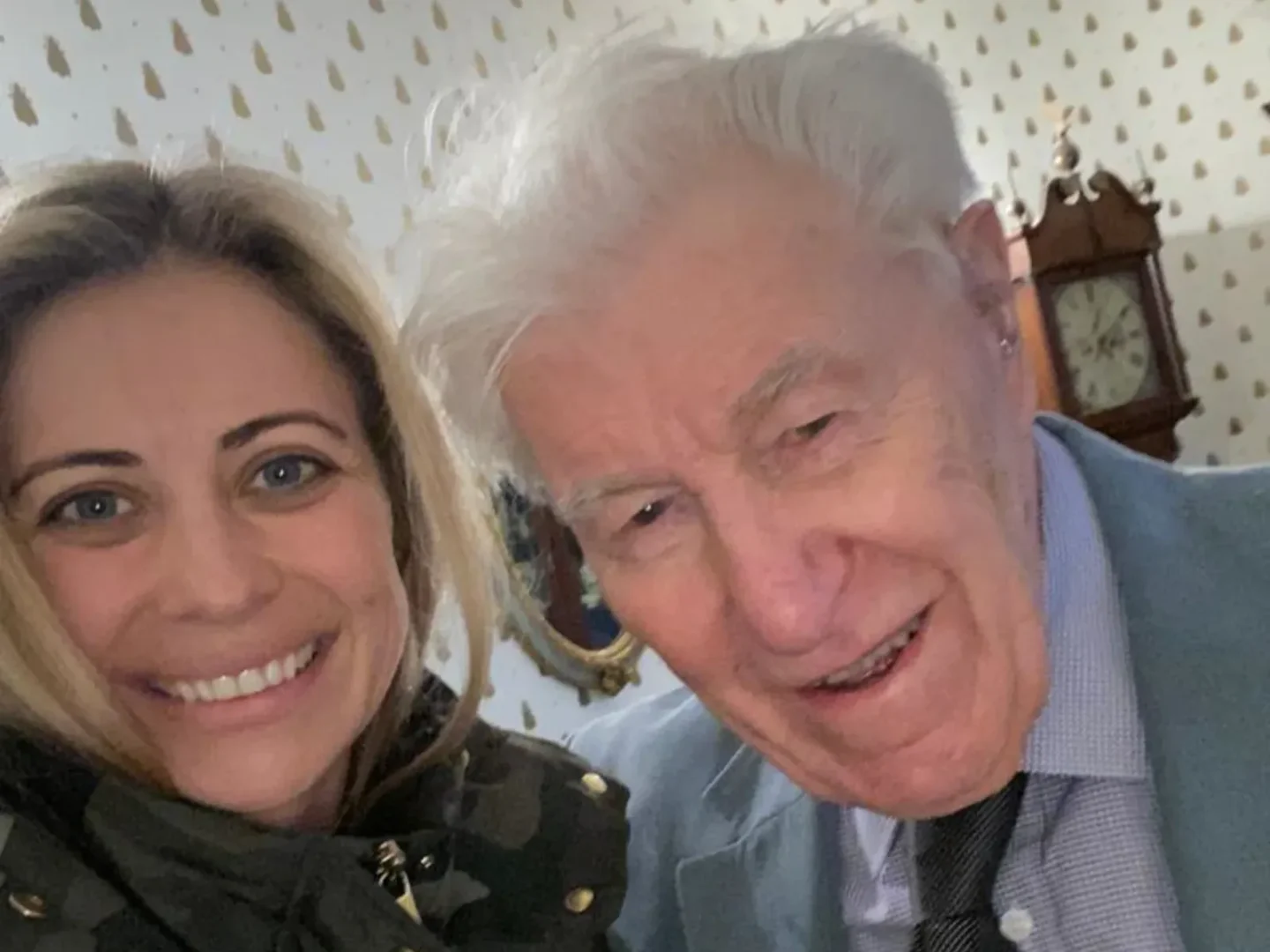 Holly Branson smiling with her elderly friend Dr Peter Emerson