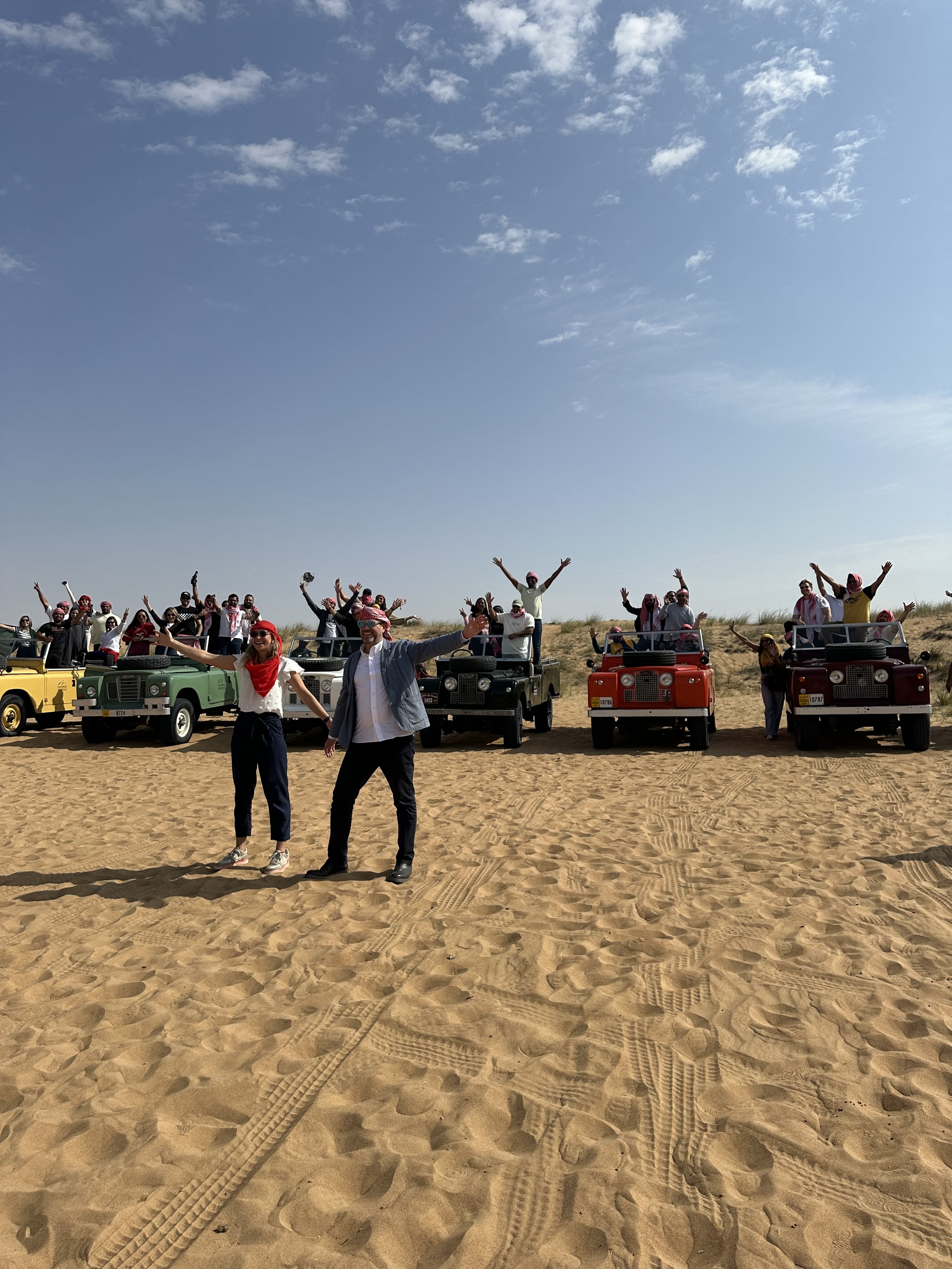Holly Branson in the Desert outsid Dubai with the team from Virgin Mobile UAE