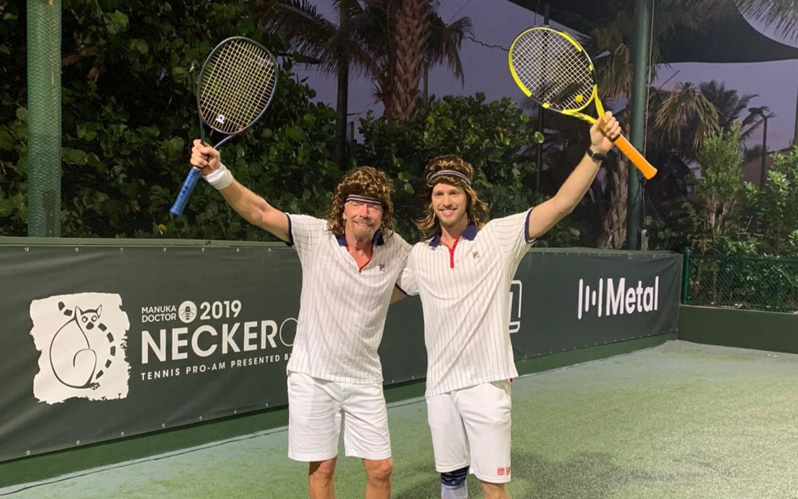 Richard and Sam Branson in matching Bjorn Borg outfits holding tennis rackets