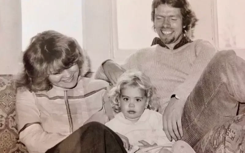 Black and white photo of Richard Branson, wife Joan and daughter Holly as a child