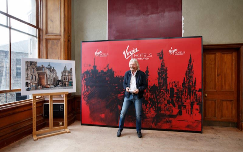 Richard Branson smiling at the announcement of Virgin Hotels Edinburgh 