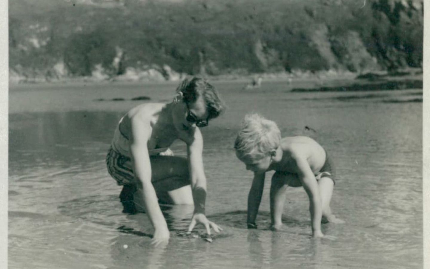 An old photo of Richard Branson playing in water with his mother Eve Branson