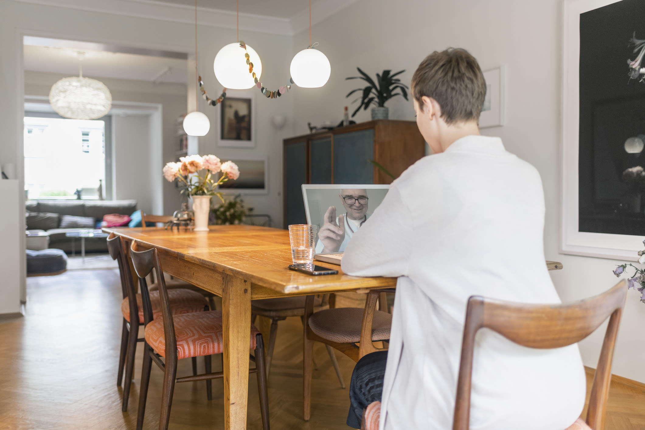 A patient has a video consultation at home with a doctor