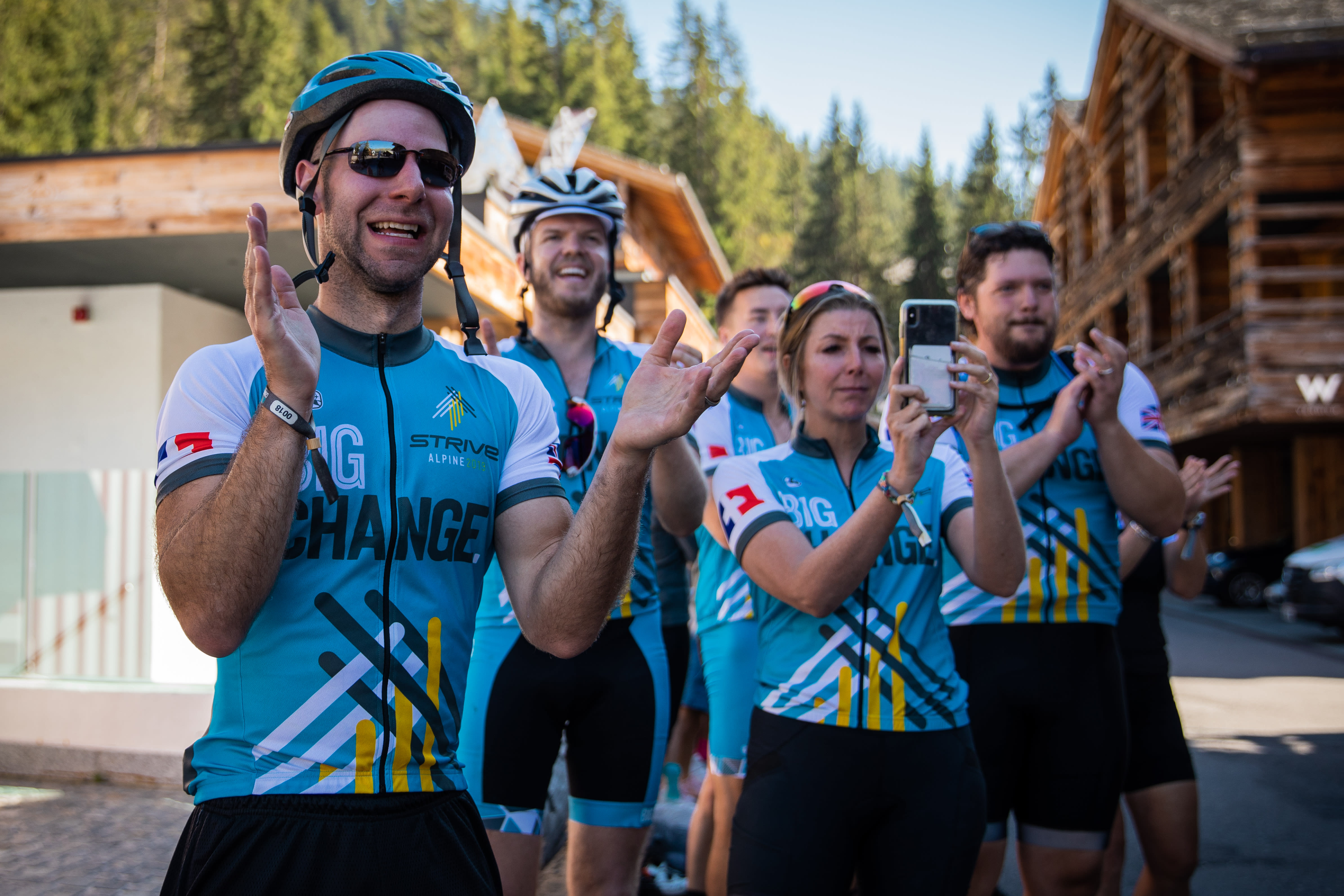 Adam Grant and Sara Blakely cheer on their team during the 2019 Strive Challenge for Big Change