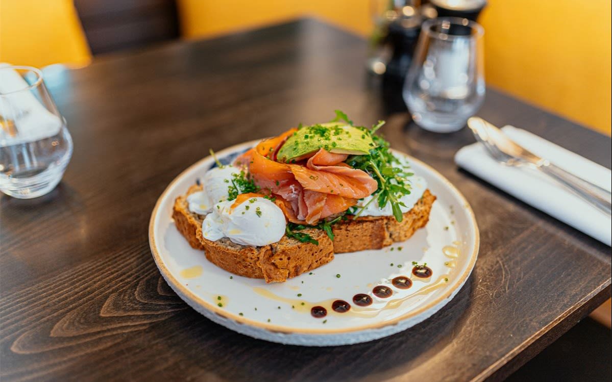 Image of smoked salmon, poached eggs, and avocado on toast.