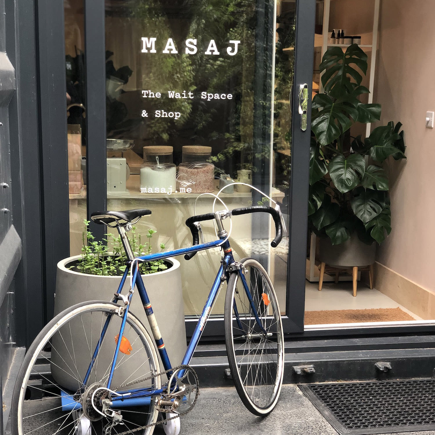 A bike outside the MASAJ studio