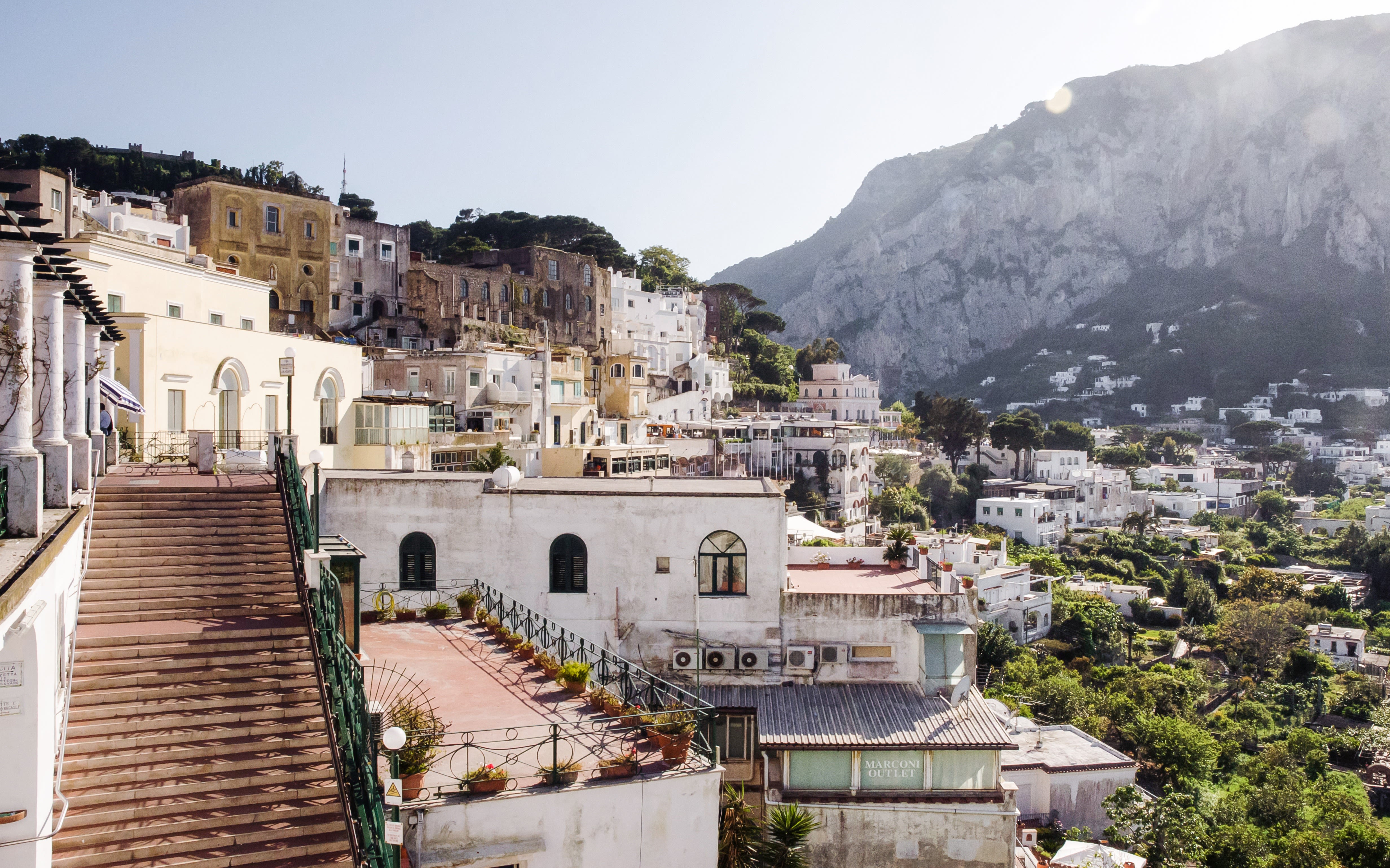 Image of steps up to houses in the hills of the Italian Island of Capri.