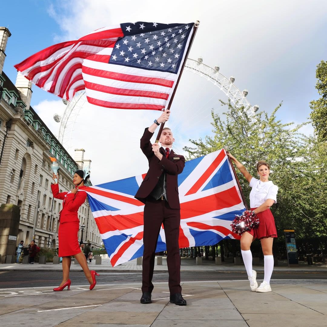 Virgin Atlantic cabin crew with US flag and UK flag