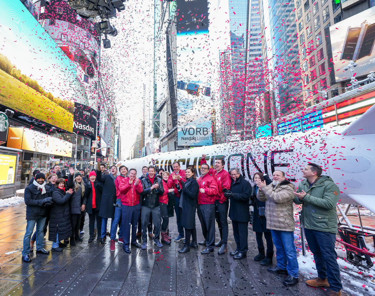 Virgin Orbit team celebrating in Times Square