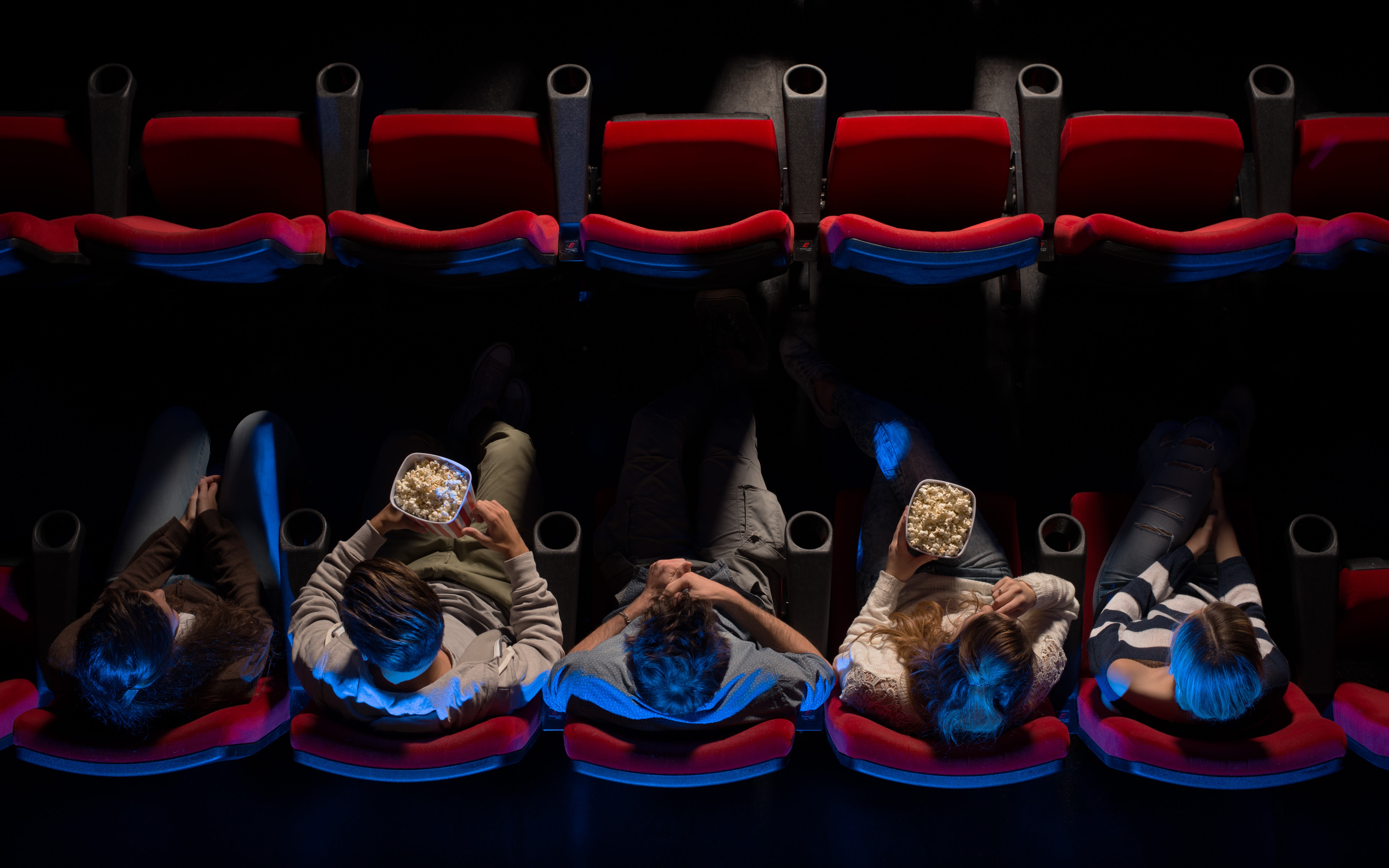 Image of people in cinema with snacks