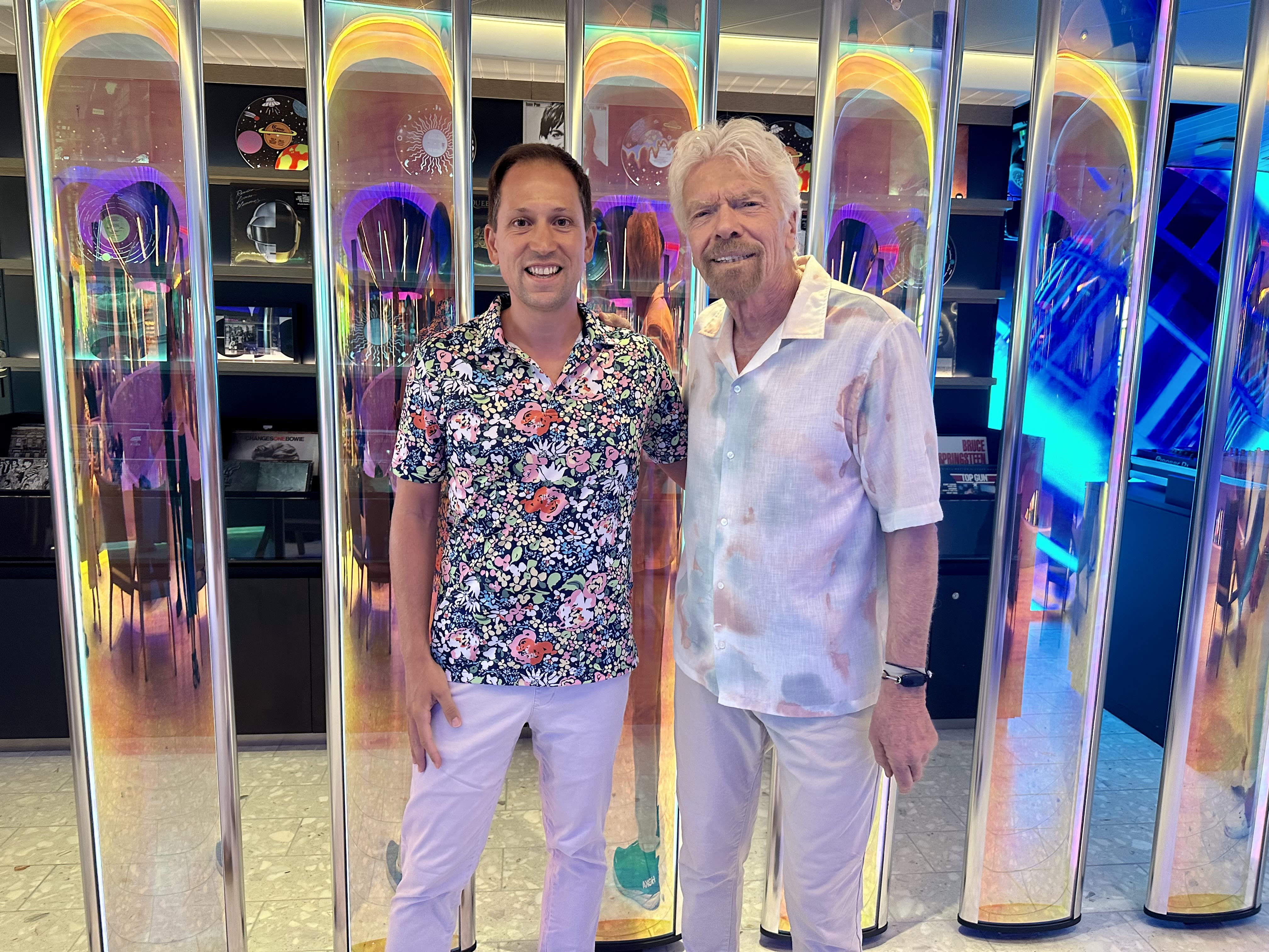Richard Branson onboard Virgin Voyages with a loyal sailor, Chris
