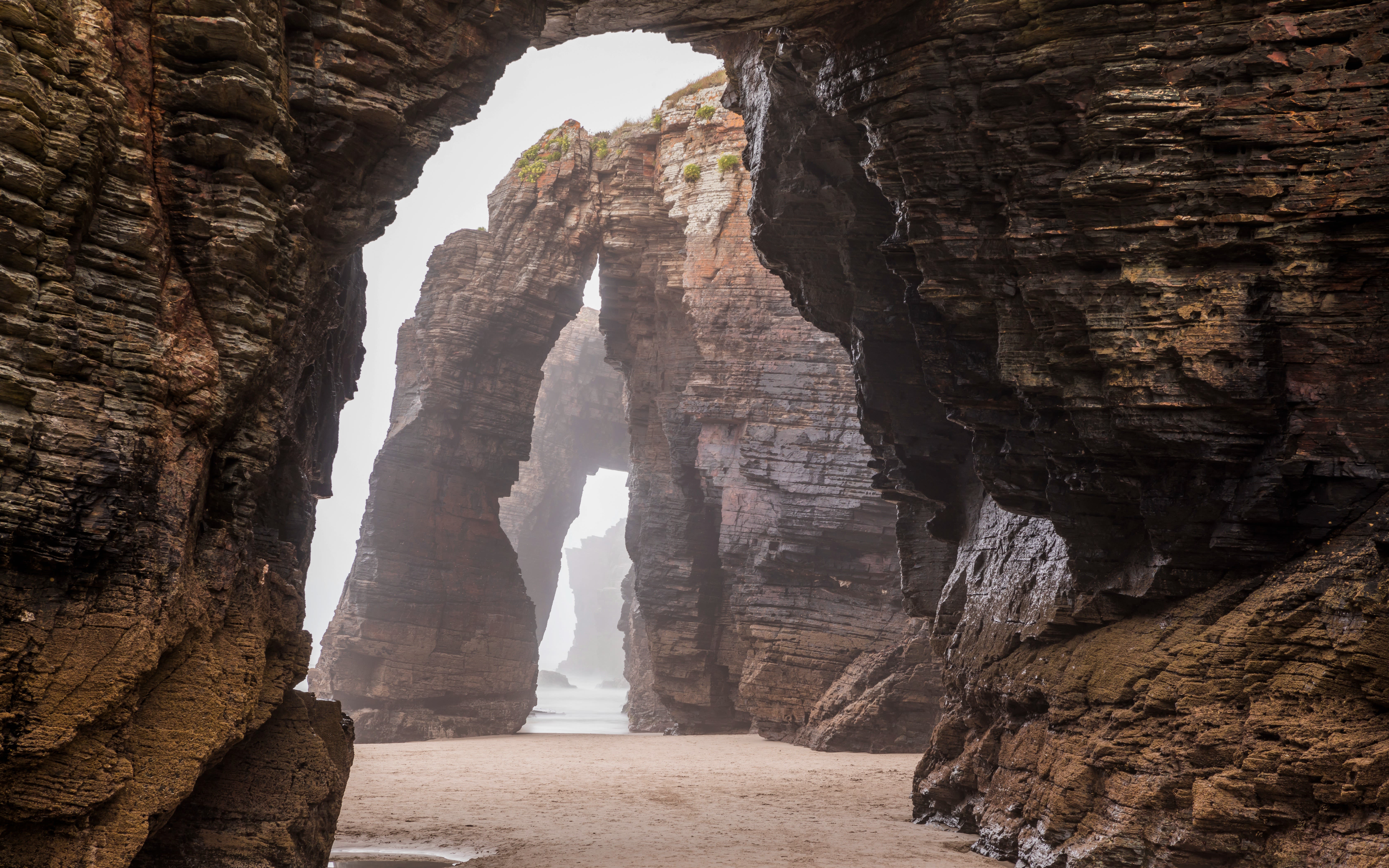 Image of the naturally formed archways on the beach in Praia As Catedrais.