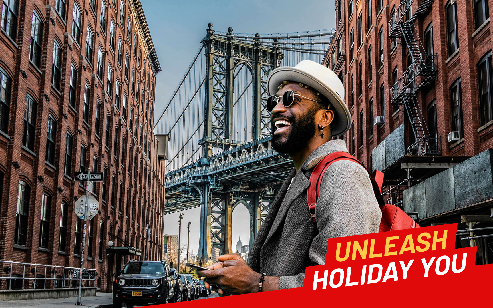 An image of a man stood under Brooklyn Bridge