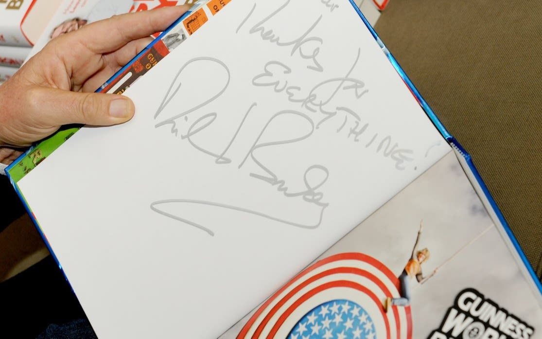 A signed note from Richard Branson inside the pages of a Guinness World Records book