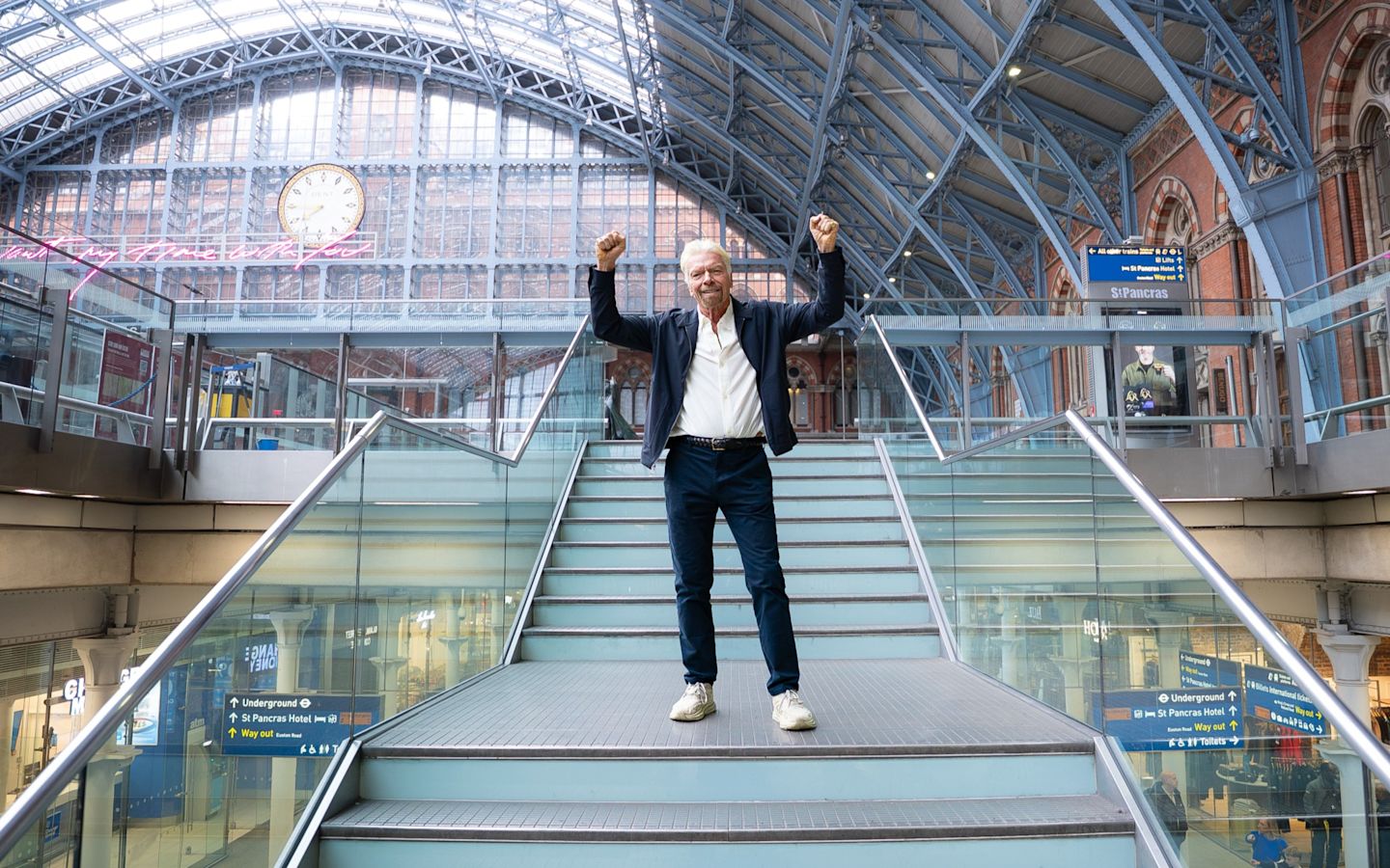 Richard Branson celebrating the St Pancras trains announcement