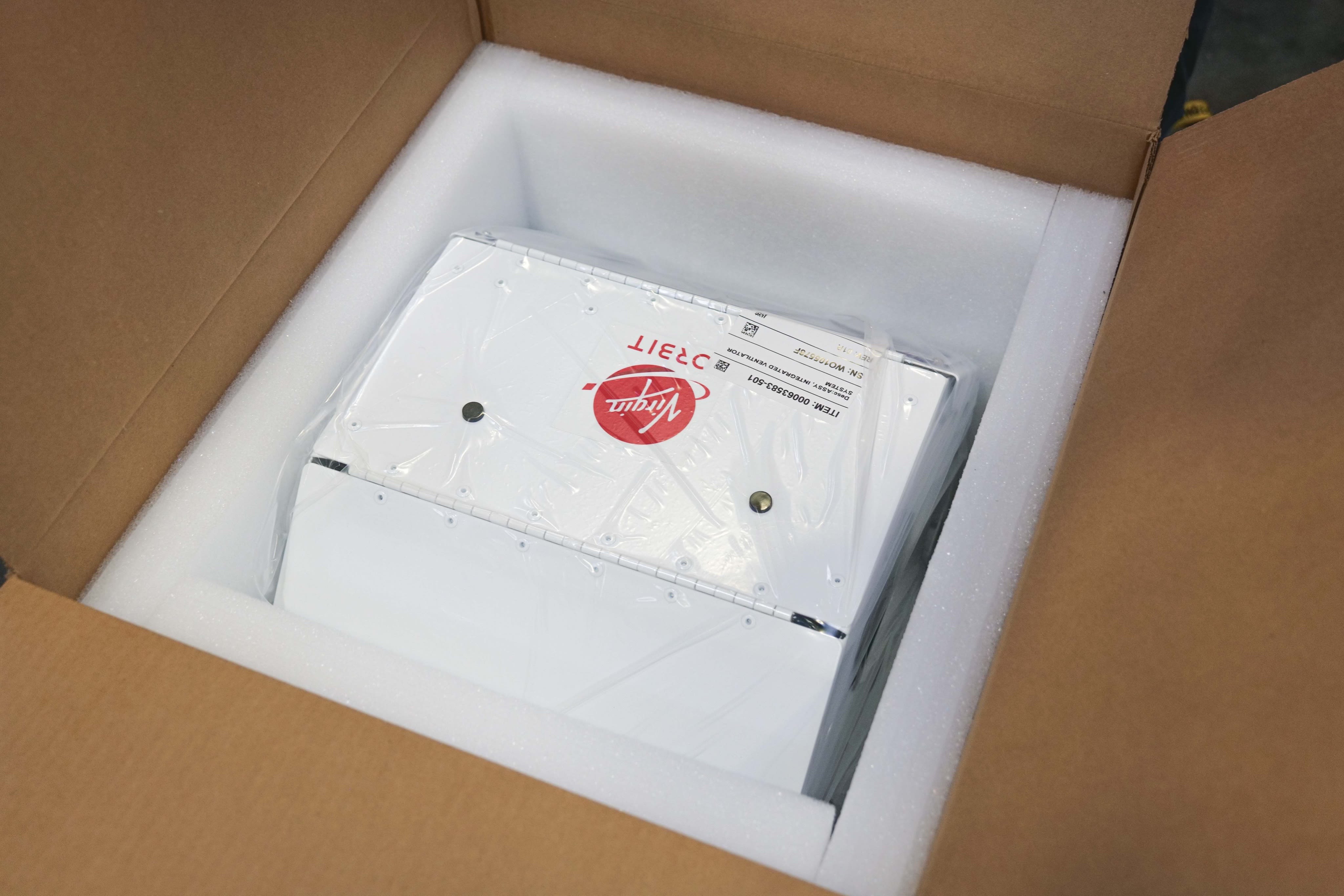A Virgin Orbit bridge ventilator boxed up ready to be shipped to a hospital