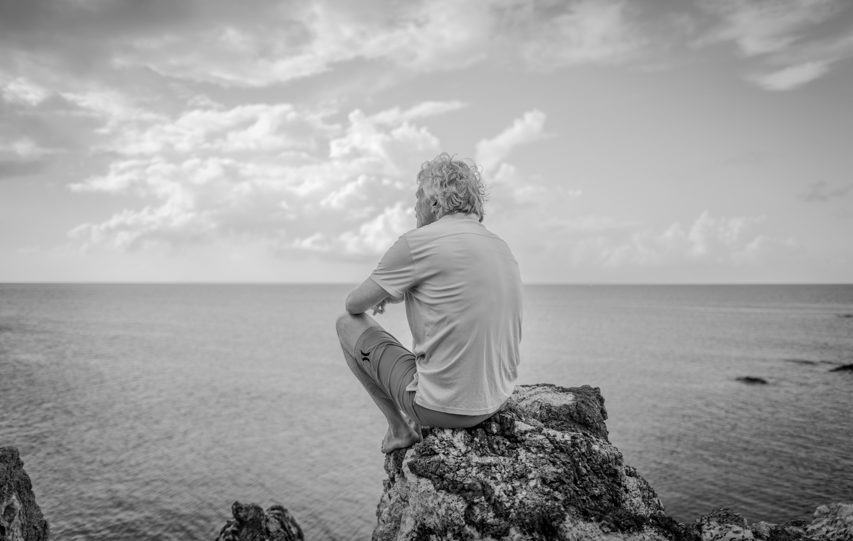 Richard Branson on Necker Island looking into the ocean