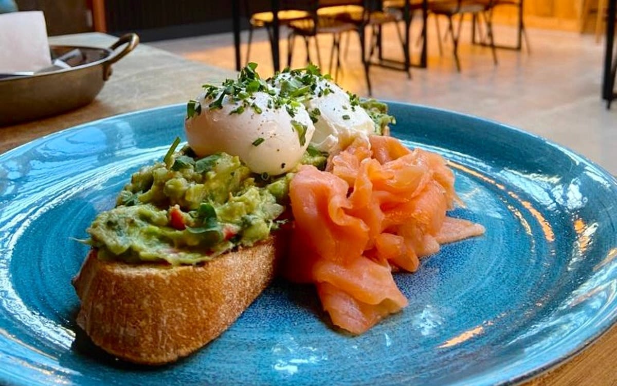 Image of eggs, avocado and smoked salmon on toast at The Rolling Mill.