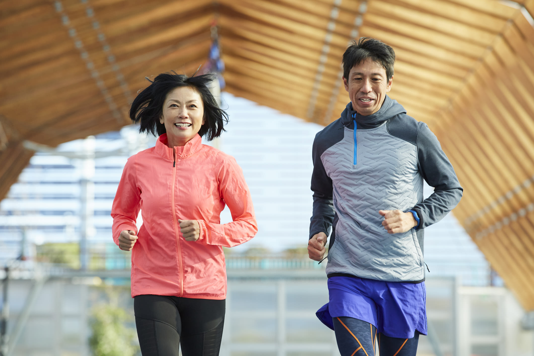 A man and woman running together