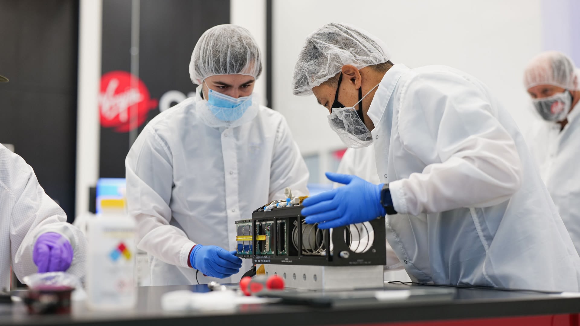 Virgin Orbit staff building rocket parts