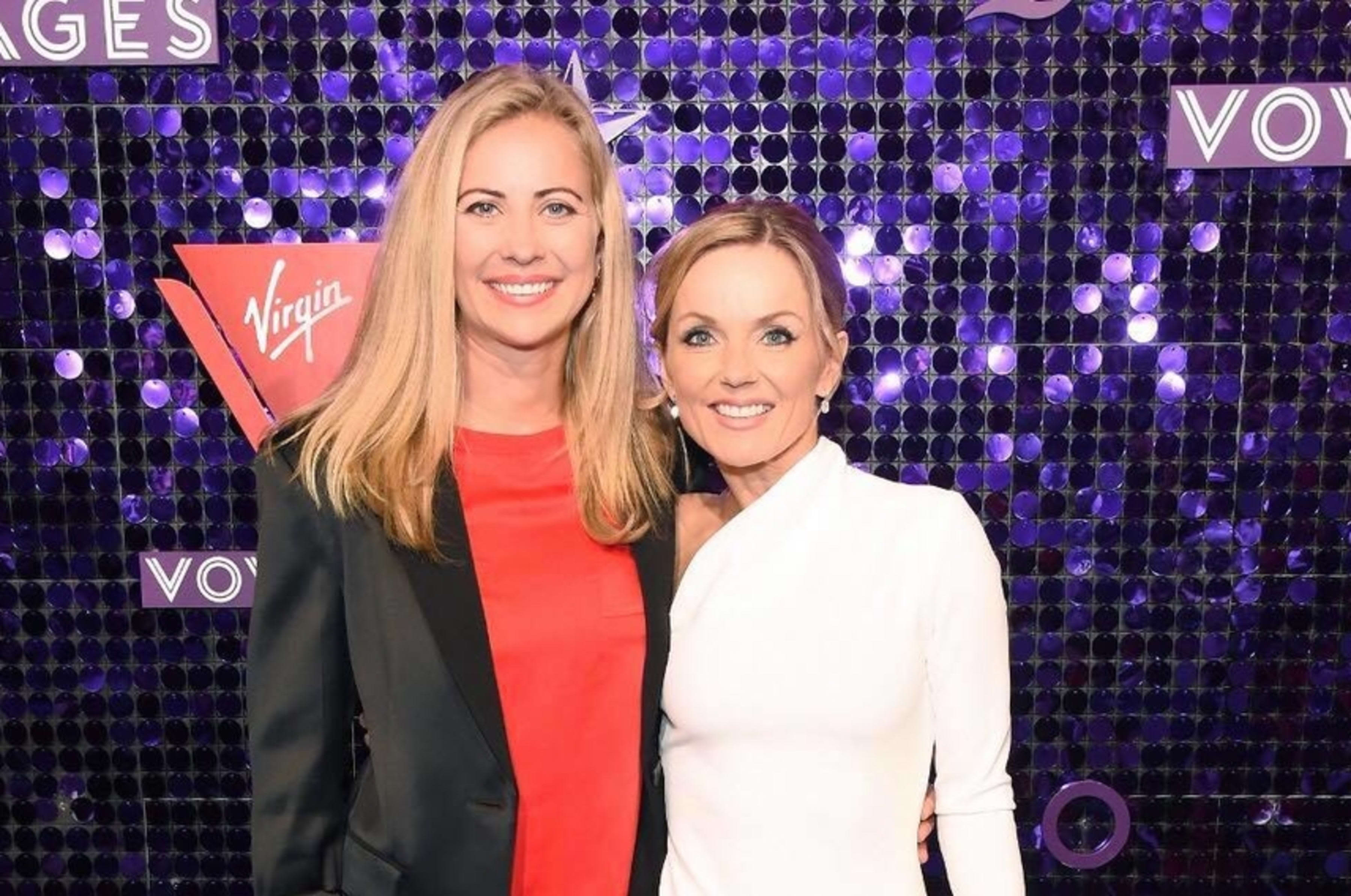 Holly Branson and Geri Halliwell in front of a sequin Virgin Voyages backdrop 