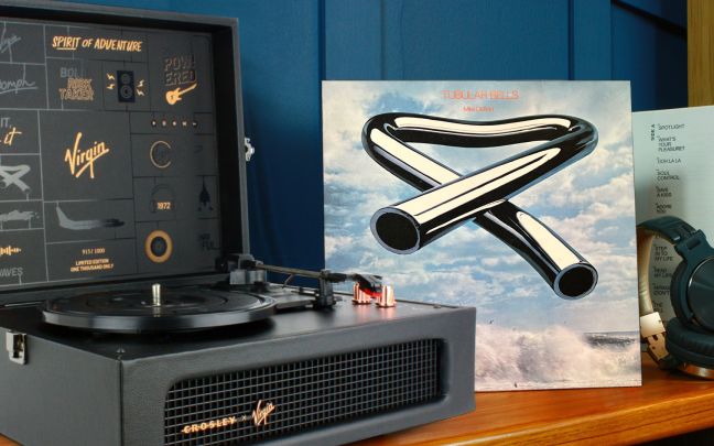 Image of a Crosley Turntable with Mike Oldfield's Tubular Bells record.
