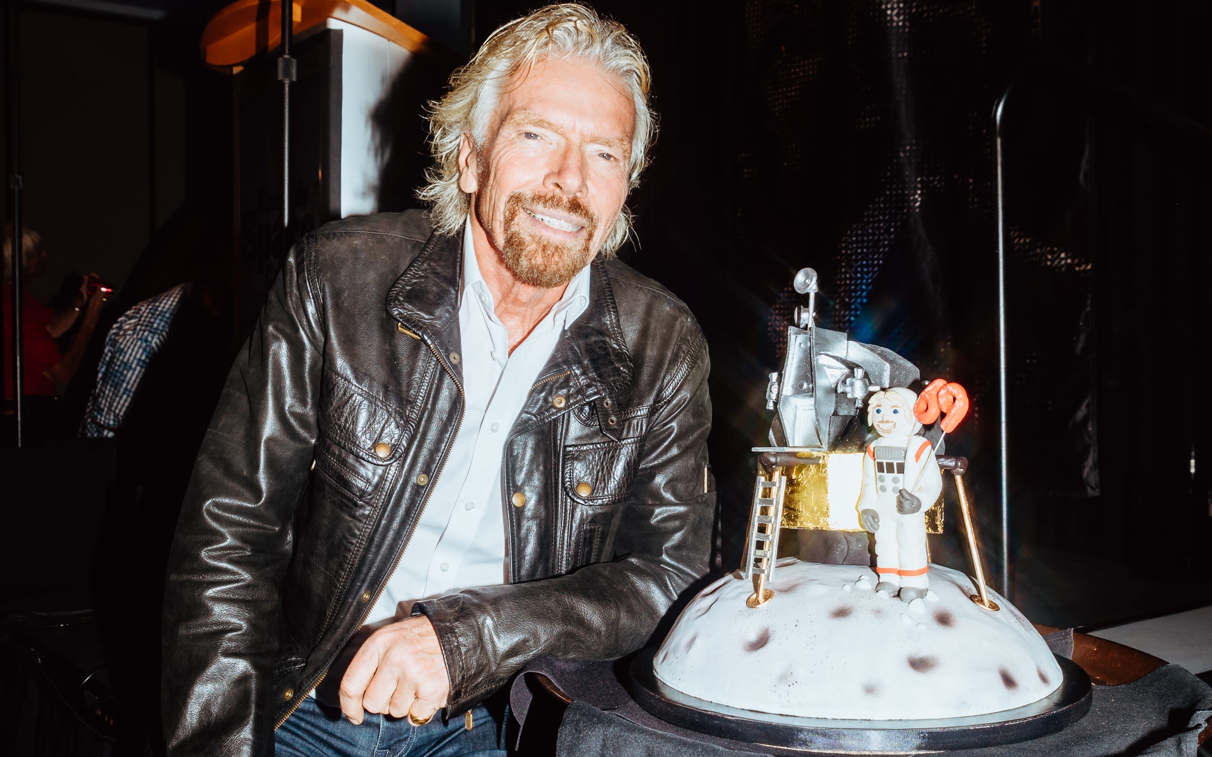 Richard Branson with his Virgin Galactic birthday cake for his 69th birthday