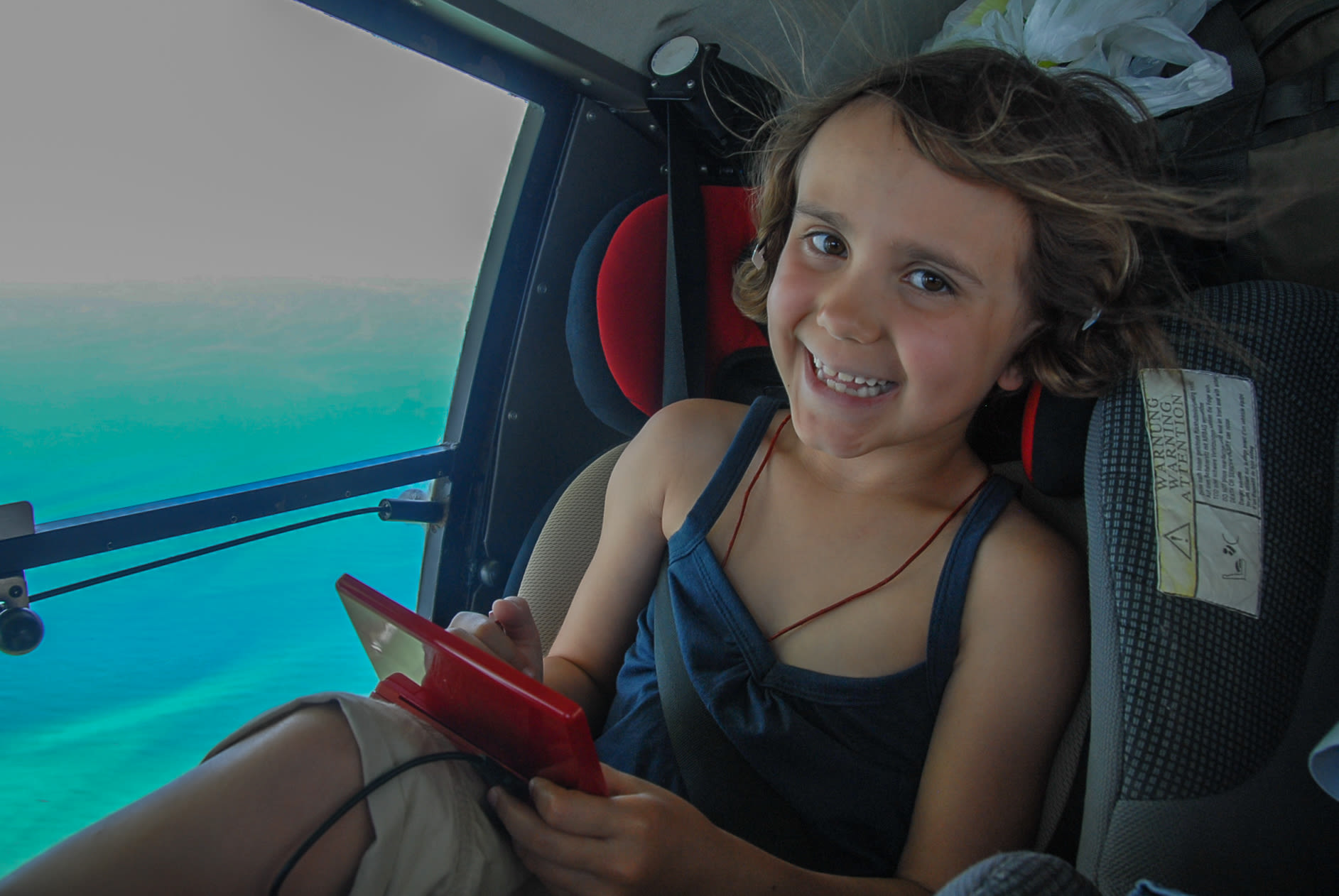 Zara Rutherford at 8-years-old flying over Mozambique