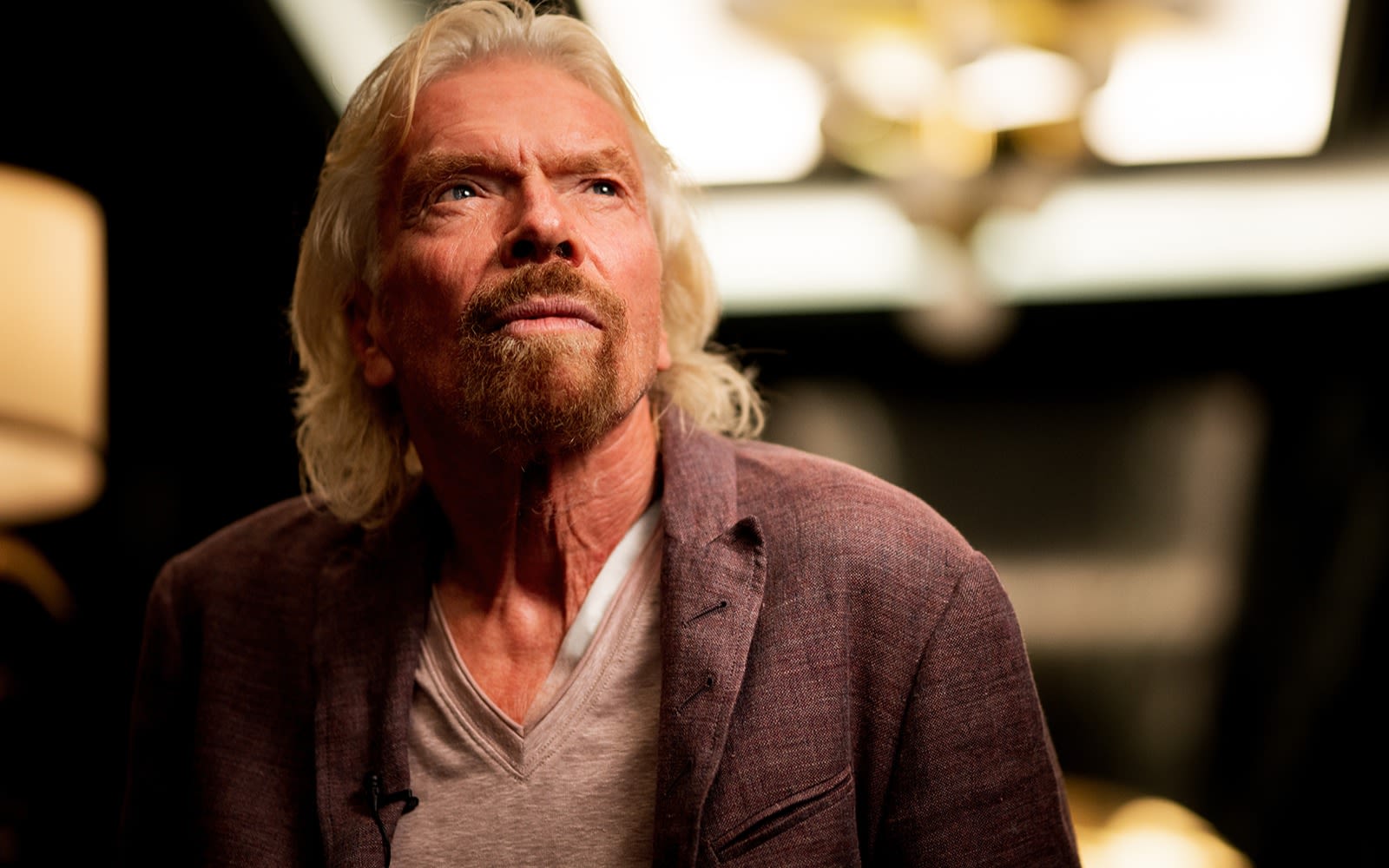 Picture of Richard Branson looking serious/contenplating 