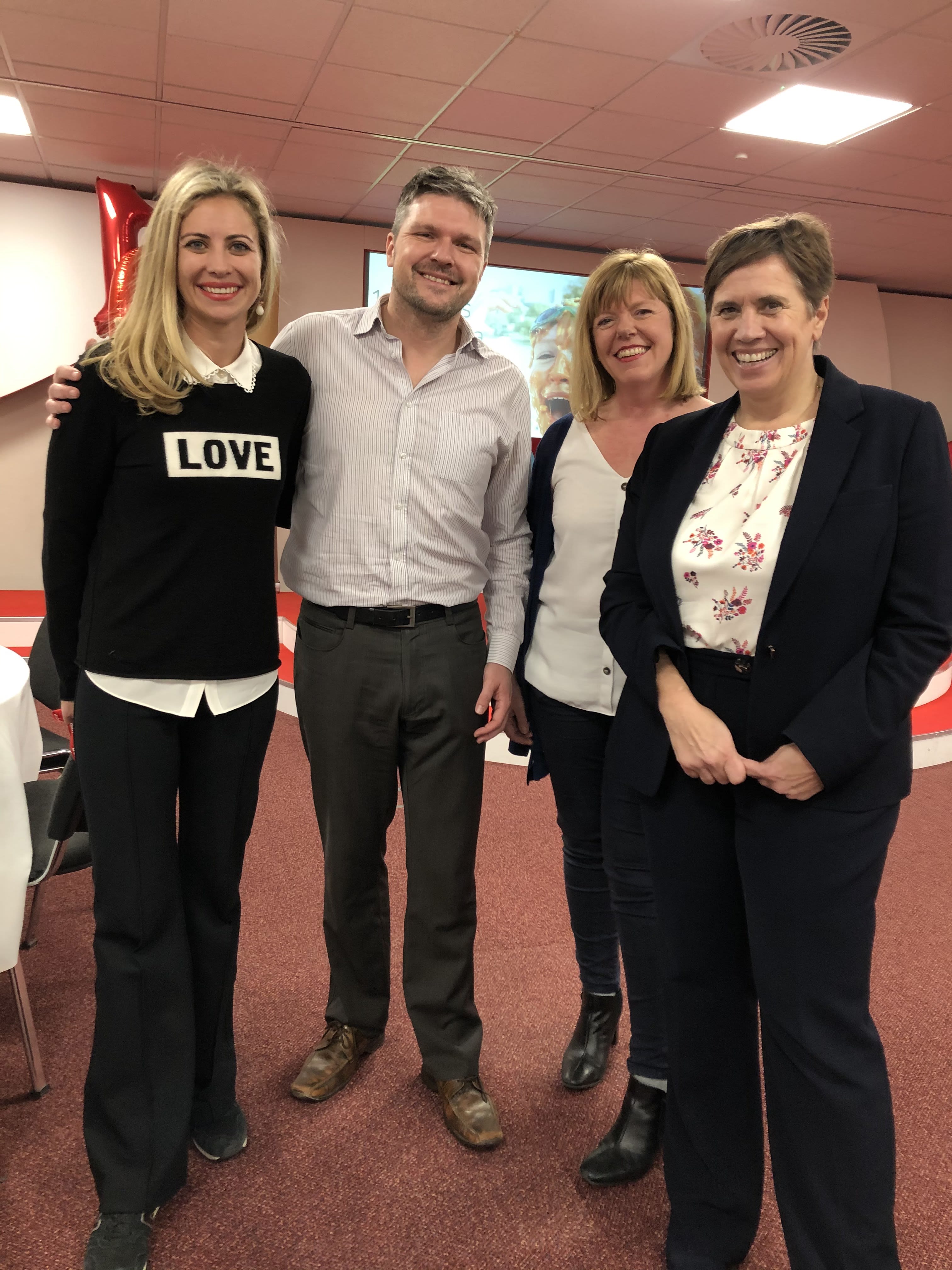 Holly Branson with members of the Virgin Money Giving team