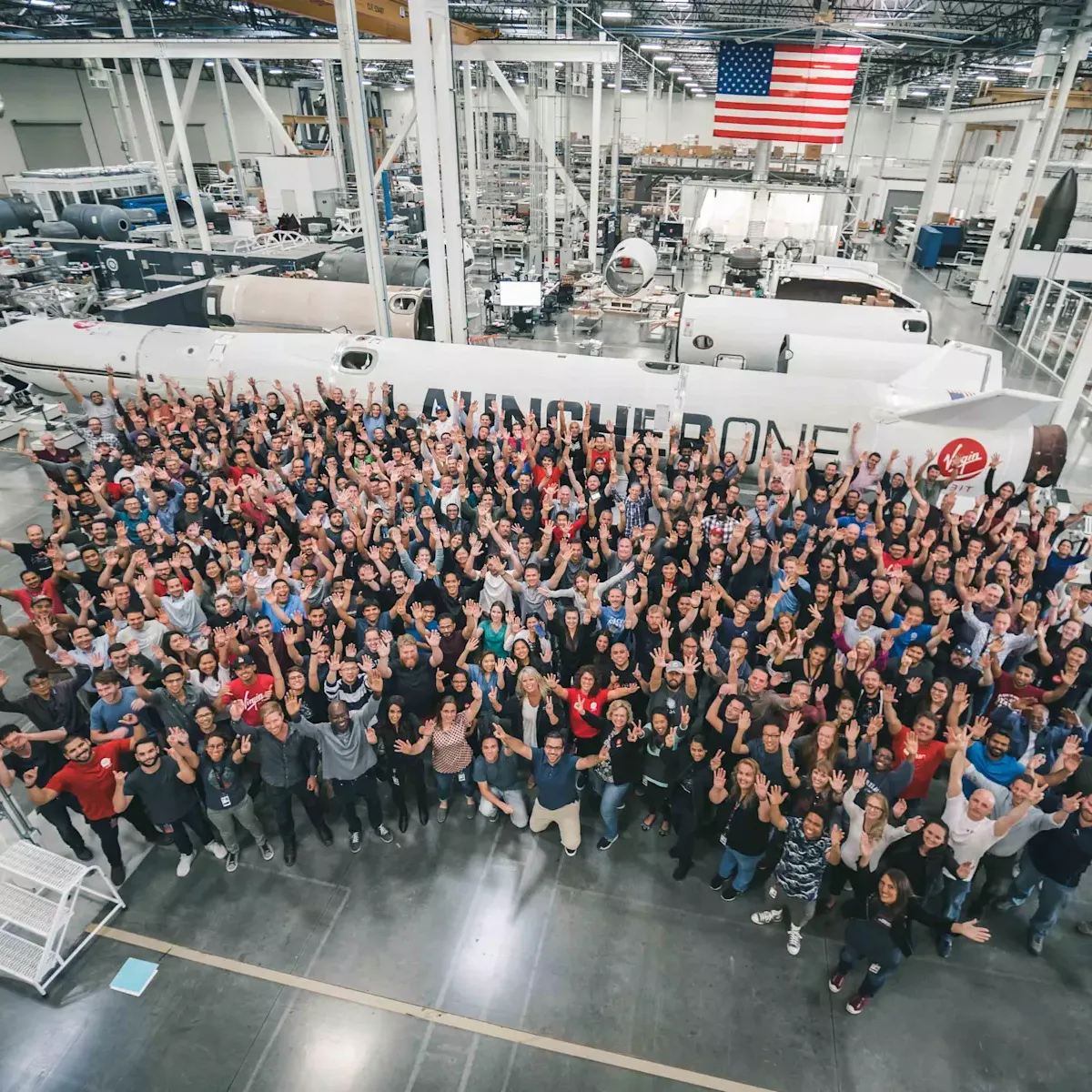 A group shot of Virgin Orbit employees celebrating