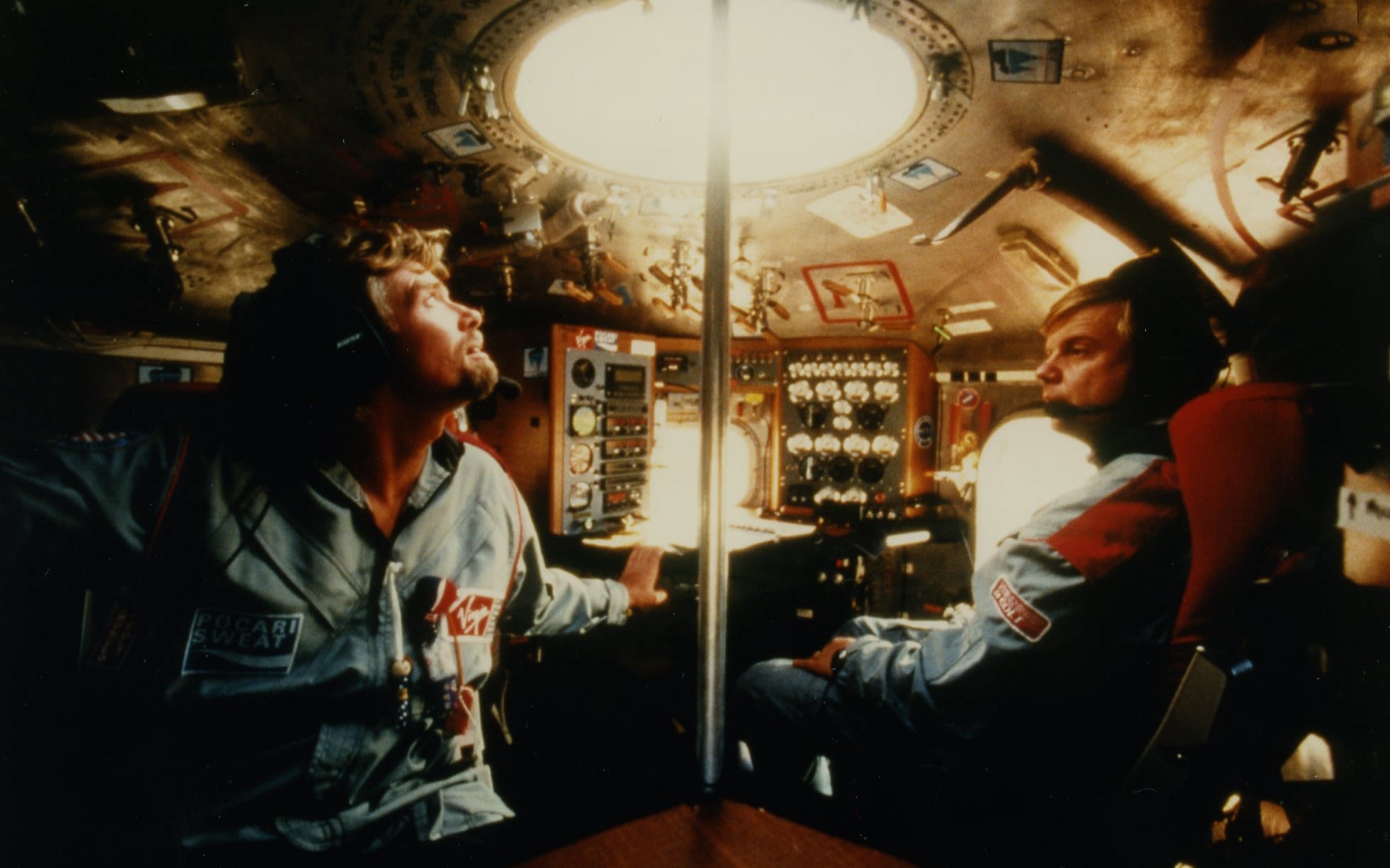 Richard Branson looks up through the open port hole on his trans-pacific balloon flight
