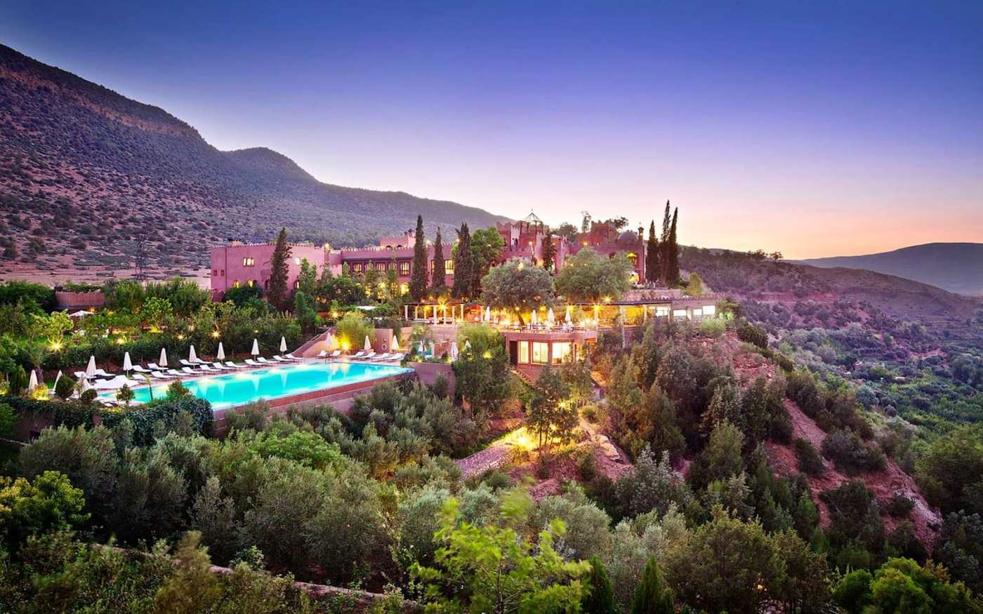 Aerial view of Kasbah Tamadot as sun sets 