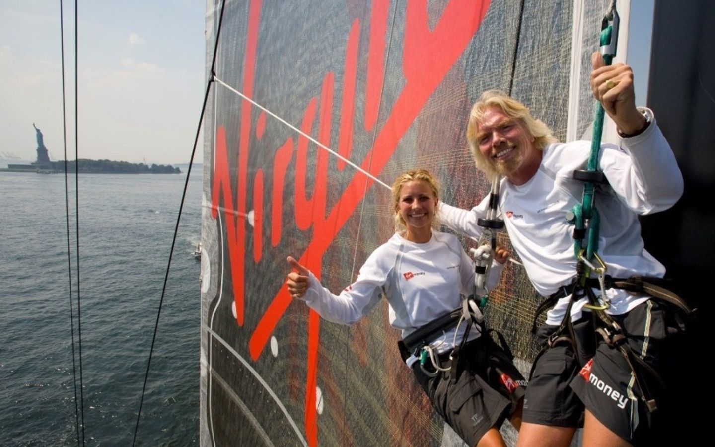 Richard Branson and Holly Branson on a boat during an attempt to break the world record for the fastest transatlantic crossing in a 99ft monoull sailboat