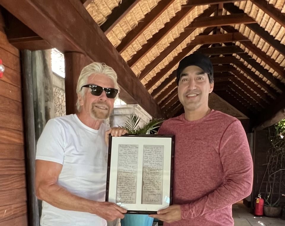 Richard Branson with a framed letter he has sent to Saddam Hussein