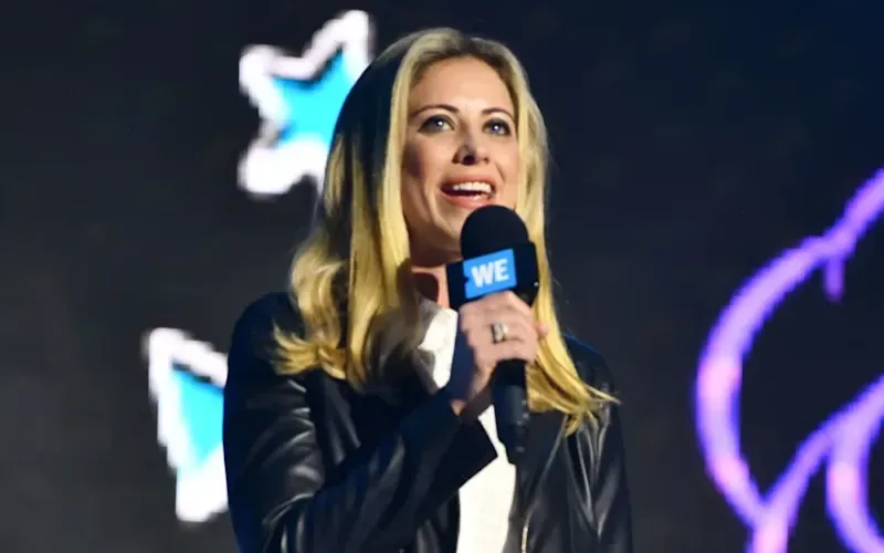 Holly Branson smiles to the crowd on stage at WE DAY UK in 2020