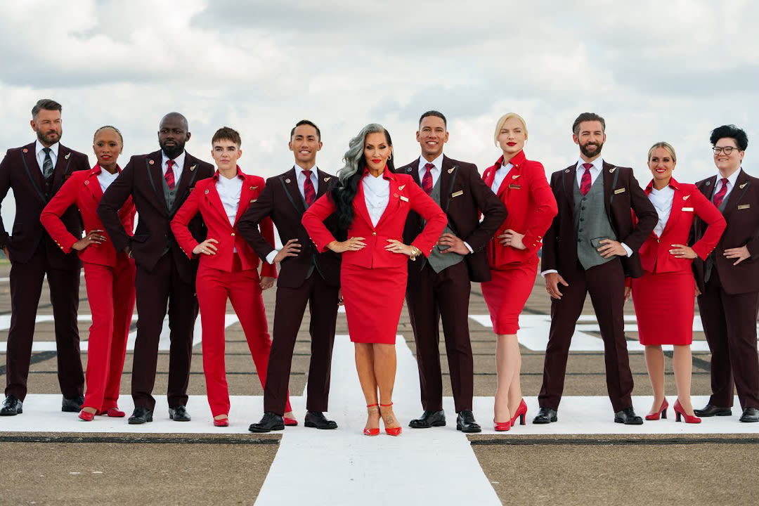 Crew members join TV personality, Michelle Visage, to showcase Virgin Atlantic’s gender identity uniform policy and pronoun badges
