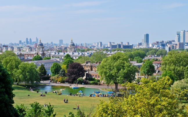 An image of London's Greenwich Park with Parliament and Big Ben in the background