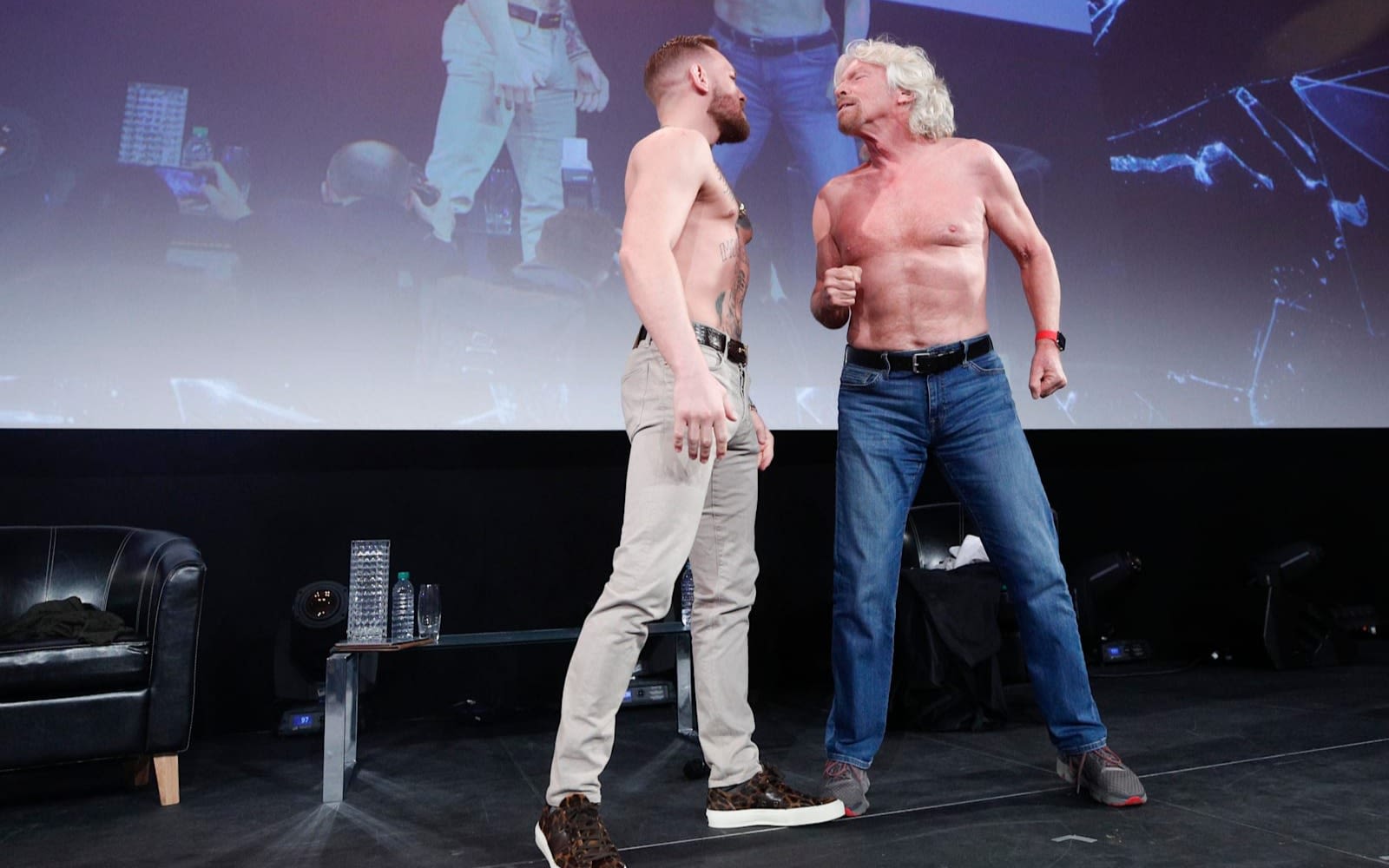 Richard Branson challenging Conor Mcgregor on stage