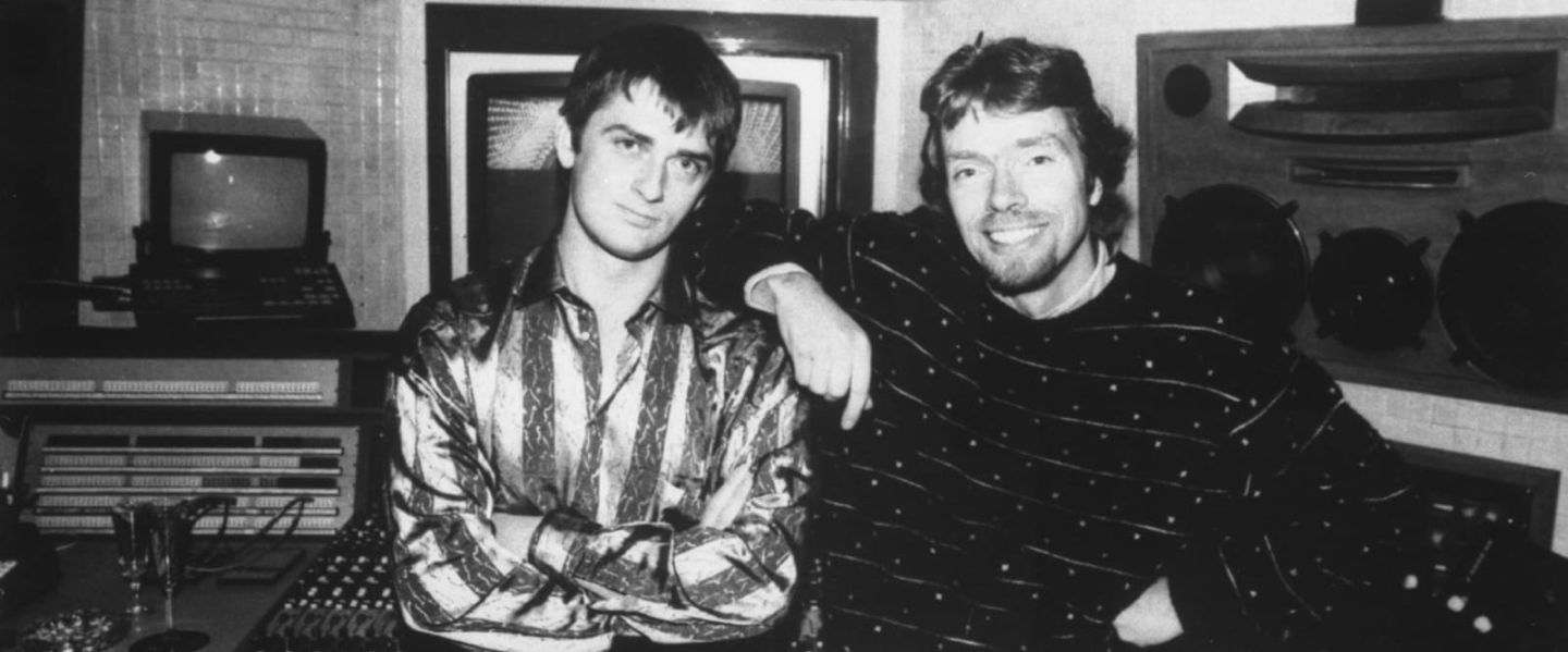 Black and white photo of young Richard Branson and Mike Oldfield