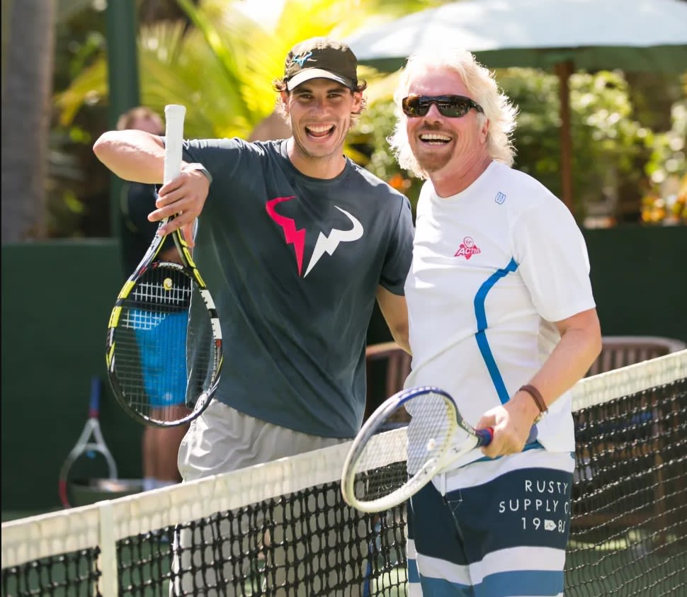 Richard Branson playing tennis with Rafael Nadal at the Necker Cup Tournament