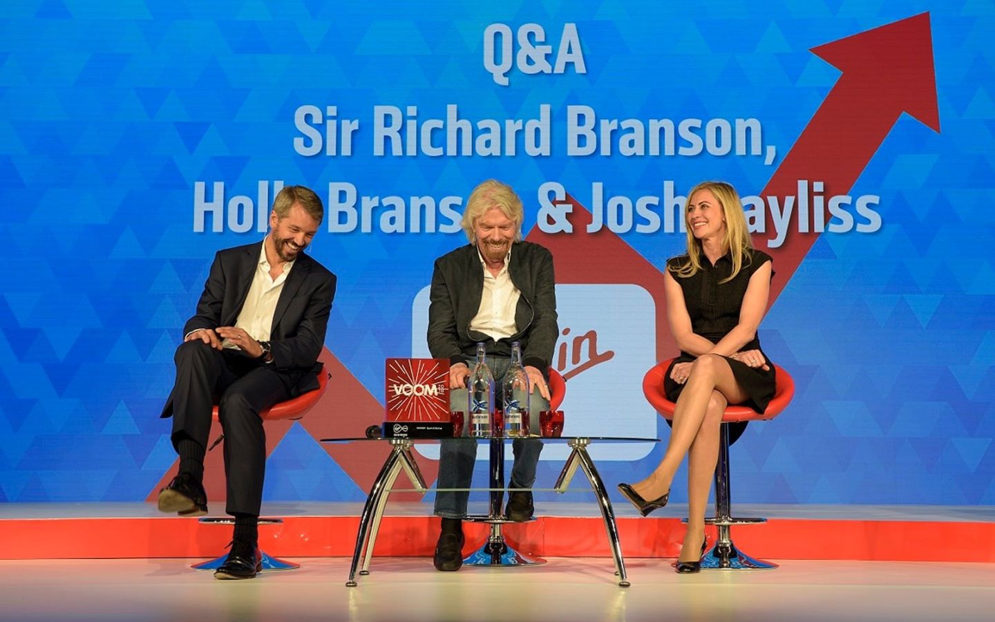 Richard Branson, Holly Branson and Josh Bayliss sit on stage ready for their Q&A session